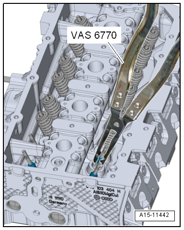 Removing and installing valve stem seals (cylinder head installed)